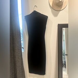 Long black dress with shoulder pads